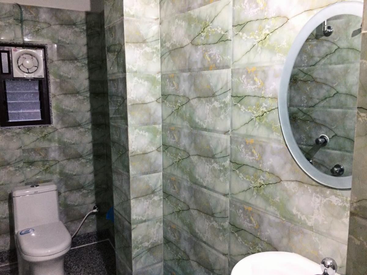 Oyo 16064 Tirupati Lodge سيليجوري المظهر الخارجي الصورة